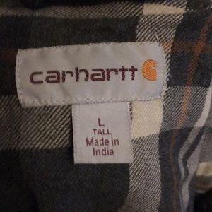 Carhart button up black jacket, condition used.